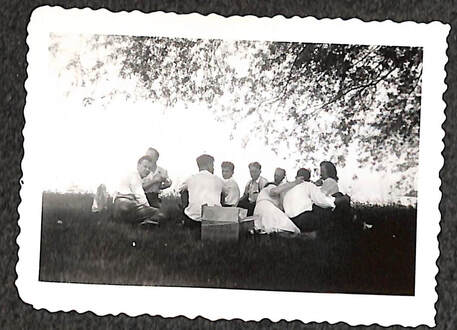 Dana students enjoying a picnic outdoors